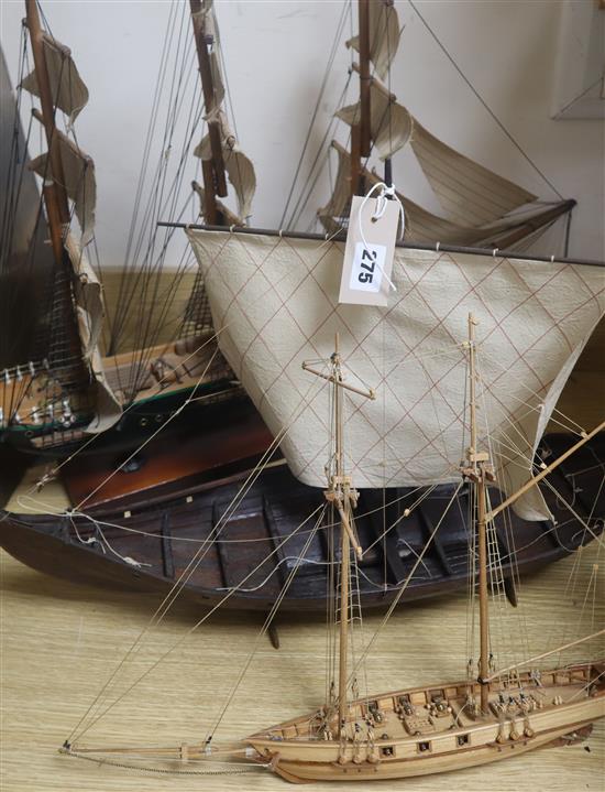 A model of a 19th century clipper, a six gun clipper and a viking long boat